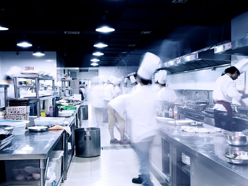 modern hotel kitchen and busy chefs.